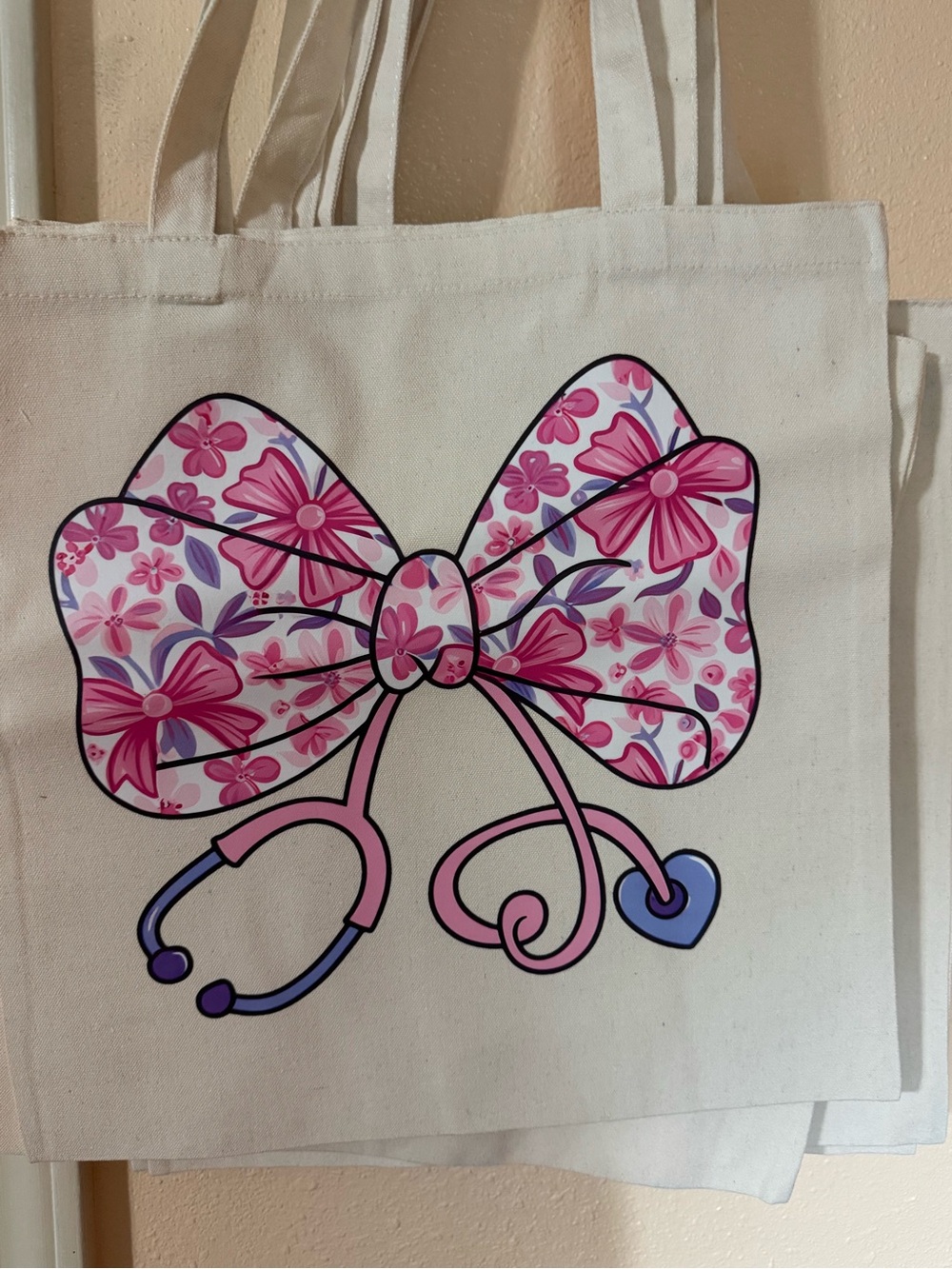 Pink Floral Bow Tote Bag with Stethoscope Graphic